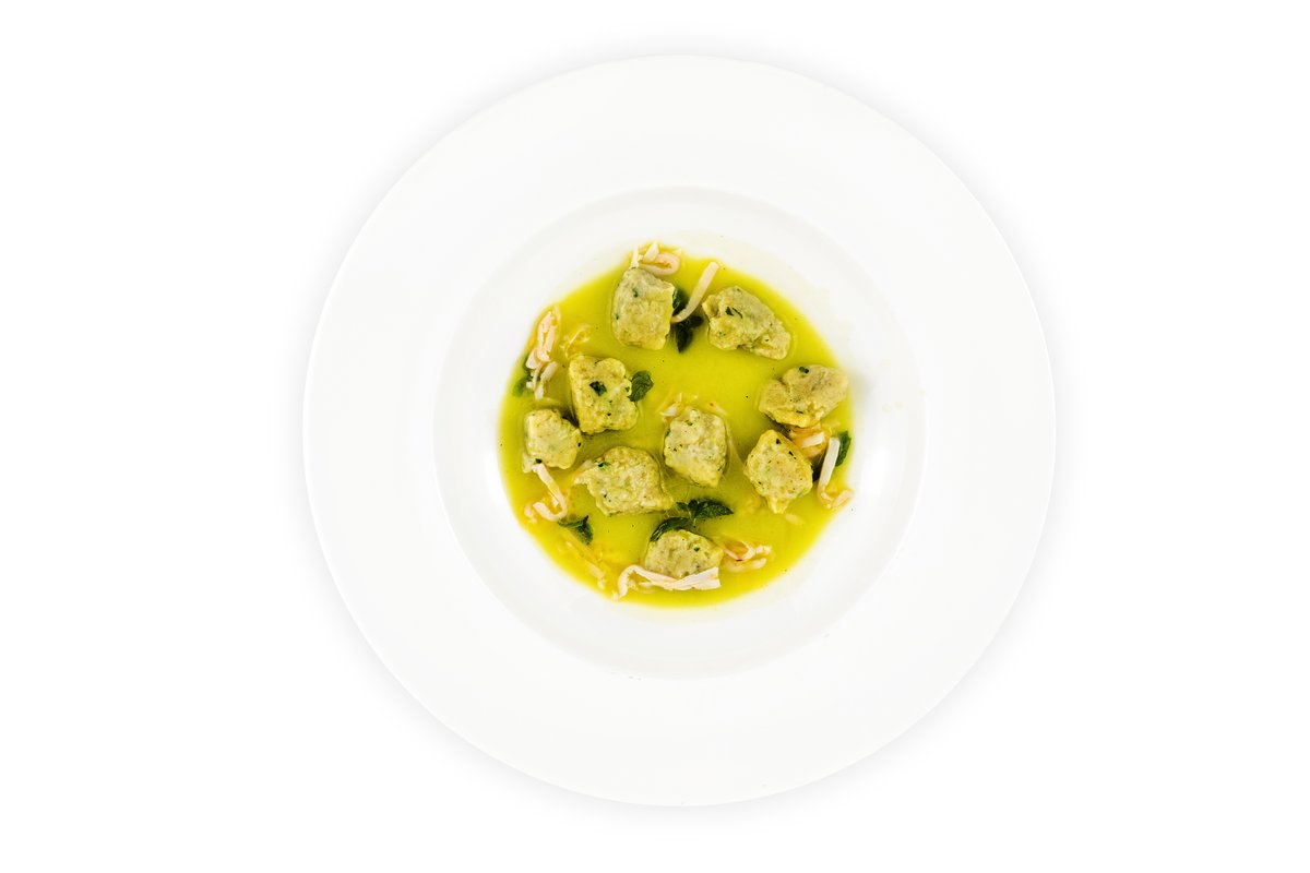 Ricotta and red shrimp gnocchi, extract of dried peas with lemon, squid and mint